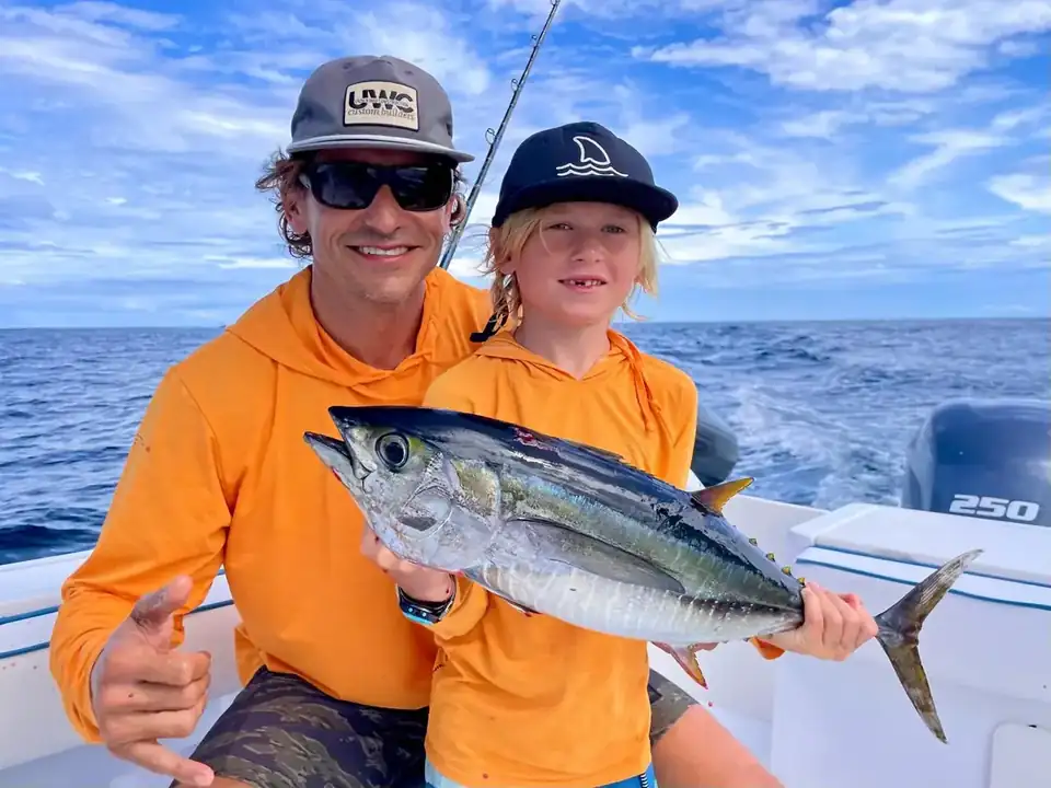 Father and son with yellowfin tuna on the Wired charter